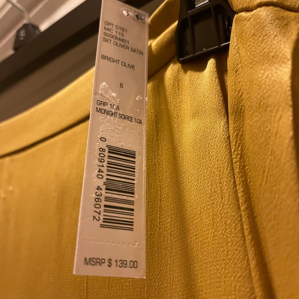 Antonio Melani premium silk skirt with cascading front side ribbon.